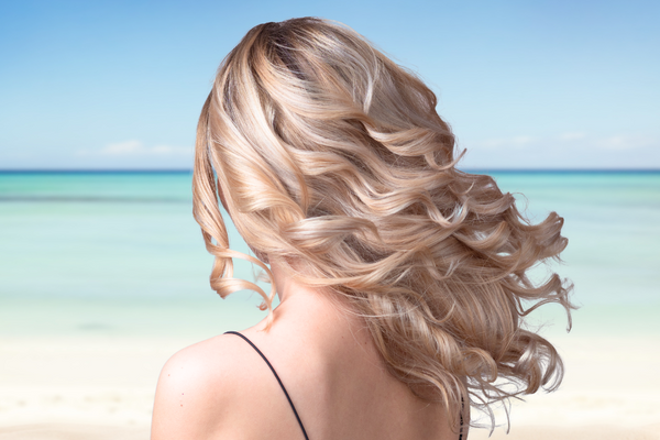 <center>Beach Babe Hair: How to Achieve the Perfect Summer Look with Hair Extensions</center>